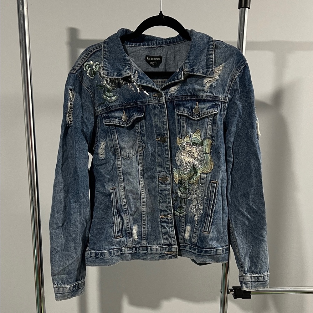 Bebe Distressed Blue Denim Jacket with Floral Details